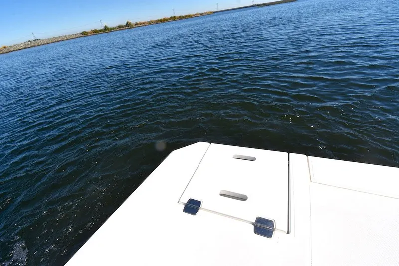 Slide: The Image of Bow of a boat on calm water with a clear view of the horizon. - 49