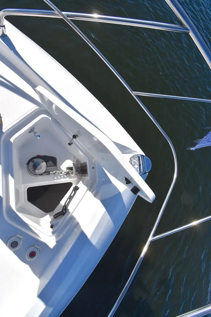 Slide: The Image of Bow view of the 2019 Cruisers Yachts 50 Cantius with anchor and stainless steel railing. - 41