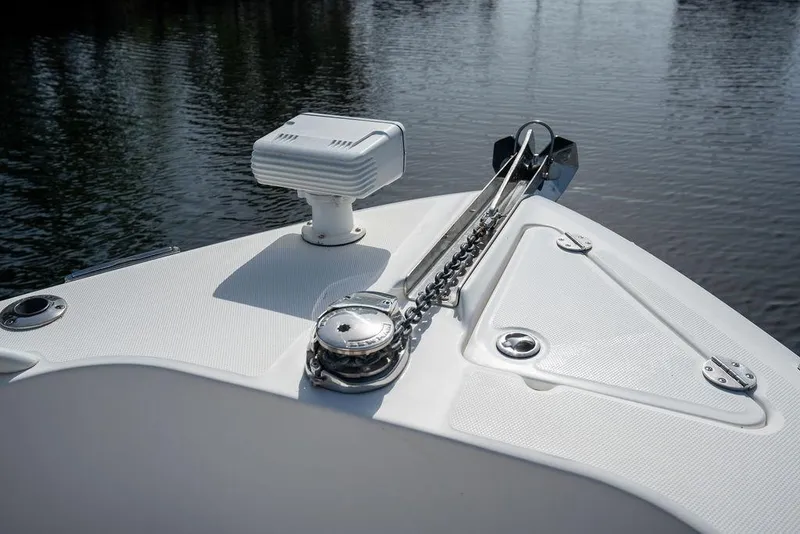 Slide: The Image of Bow of 2006 Everglades 290 Center Console with anchor chain and marine equipment. - 15
