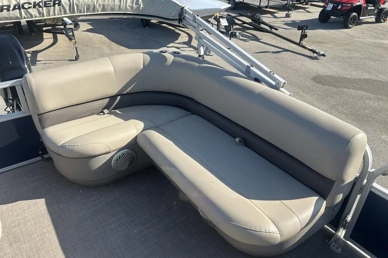 Slide: The Image of 2023 Sun Tracker Bass Buggy 16 XL Select pontoon boat with beige seating. - 7