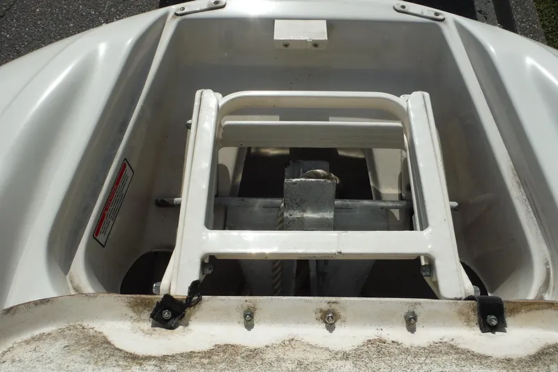 Slide: The Image of 2005 Sea Ray 240 Sundeck boat ladder and storage compartment detail. - 15