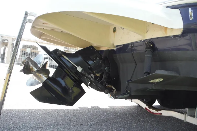 Slide: The Image of 2005 Sea Ray 240 Sundeck boat stern with propeller and outdrive detail. - 5