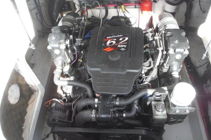 Slide: The Image of Engine compartment of a 2005 Sea Ray 240 Sundeck with MerCruiser 6.2 MPI engine. - 13
