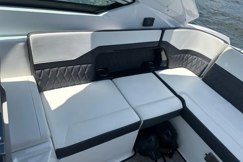 Slide: The Image of Luxurious seating on a 2019 Monterey 328SS Super Sport boat, featuring elegant upholstery. - 11