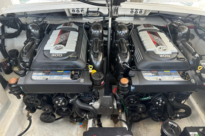 Slide: The Image of Twin Mercury 6.2L engines in a 2019 Monterey 328SS Super Sport boat. - 15
