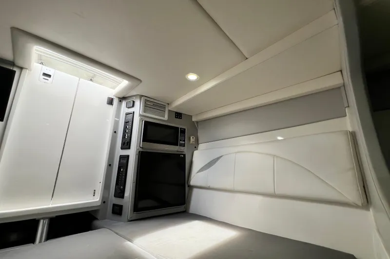 Slide: The Image of Interior of 2016 Extreme Boats XC38, featuring modern design and built-in appliances. - 158