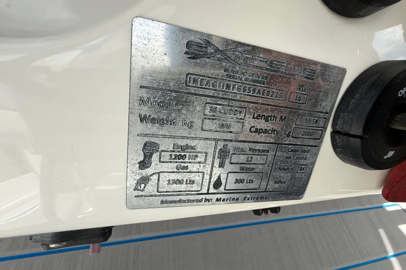 Slide: The Image of 2016 Extreme Boats XC38 specification plate with engine and capacity details. - 85