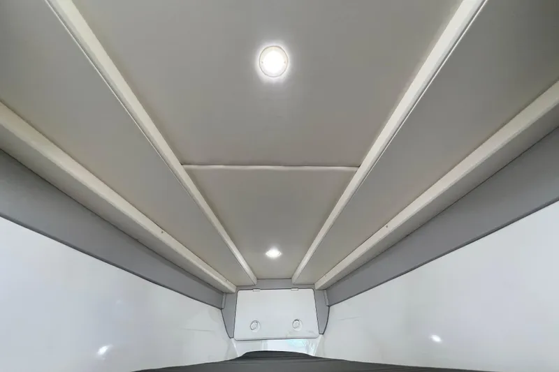 Slide: The Image of Interior ceiling of 2016 Extreme Boats XC38, featuring modern design and recessed lighting. - 157