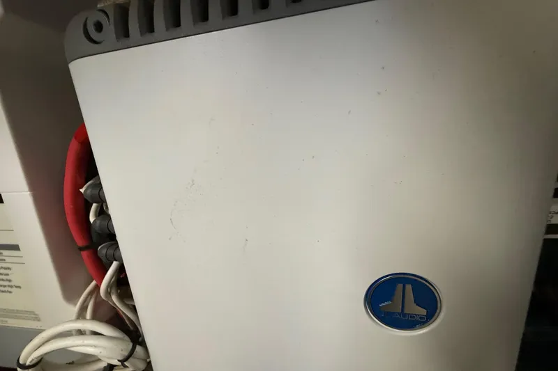 Slide: The Image of JL Audio equipment on a 2016 Extreme Boats XC38, with visible wiring. - 129