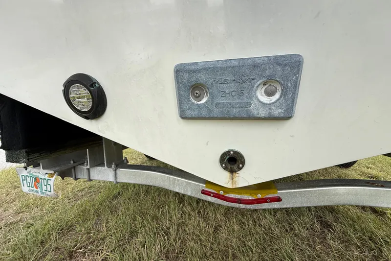 Slide: The Image of Rear view of a 2016 Extreme Boats XC38 on a trailer, showing hull details. - 52