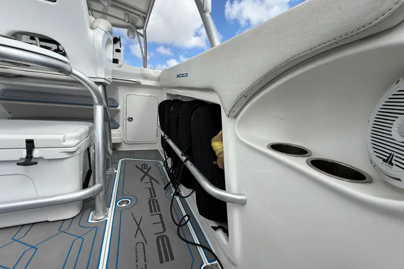 Slide: The Image of Interior view of 2016 Extreme Boats XC38, featuring seating and storage compartments. - 98