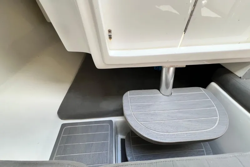 Slide: The Image of Interior view of 2016 Extreme Boats XC38, featuring sleek wooden steps and modern design. - 162