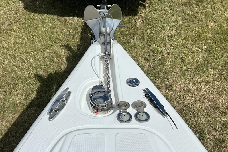 Slide: The Image of Bow of 2016 Extreme Boats XC38 with anchor and deck fittings on grass. - 177