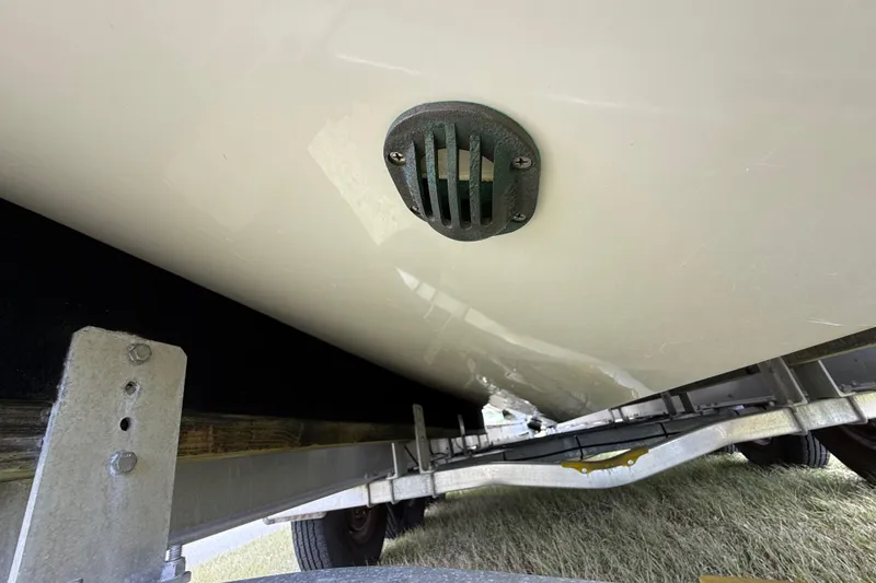 Slide: The Image of Underside view of a 2016 Extreme Boats XC38 on a trailer. - 60