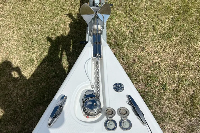 Slide: The Image of Bow of 2016 Extreme Boats XC38 with anchor and chain on grass. - 178