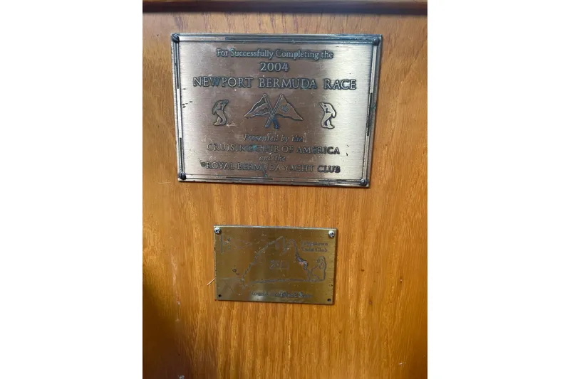 Slide: The Image of Plaques on Hinckley Sou'wester 59, 1985, commemorating 2004 Newport Bermuda Race completion. - 21