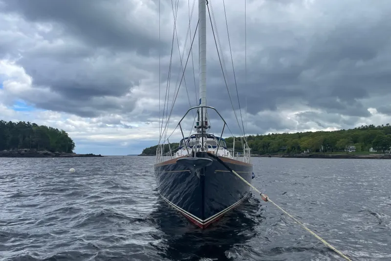 Slide: The Image of Hinckley Sou'wester 59 sailboat anchored on a cloudy day, 1985 model. - 1