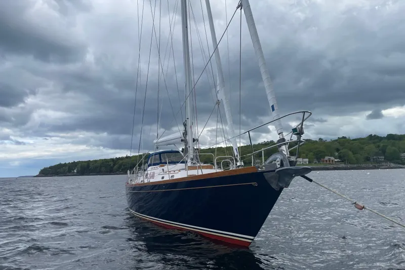 The Image of Hinckley Sou'wester 59 sailboat from 1985 anchored on a cloudy day. - 0
