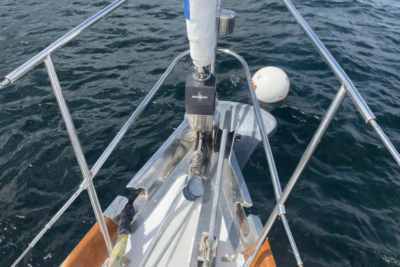 Slide: The Image of Bow of 1985 Hinckley Sou'wester 59 sailboat with anchor and ocean view. - 7