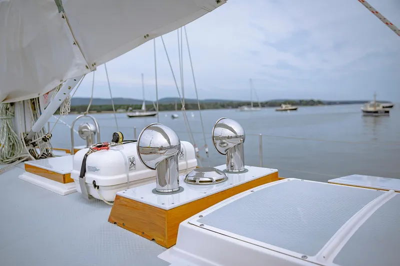 Slide: The Image of Sailboat deck view with chrome fittings, Shannon 47/52 model, 2001, anchored in calm waters. - 23