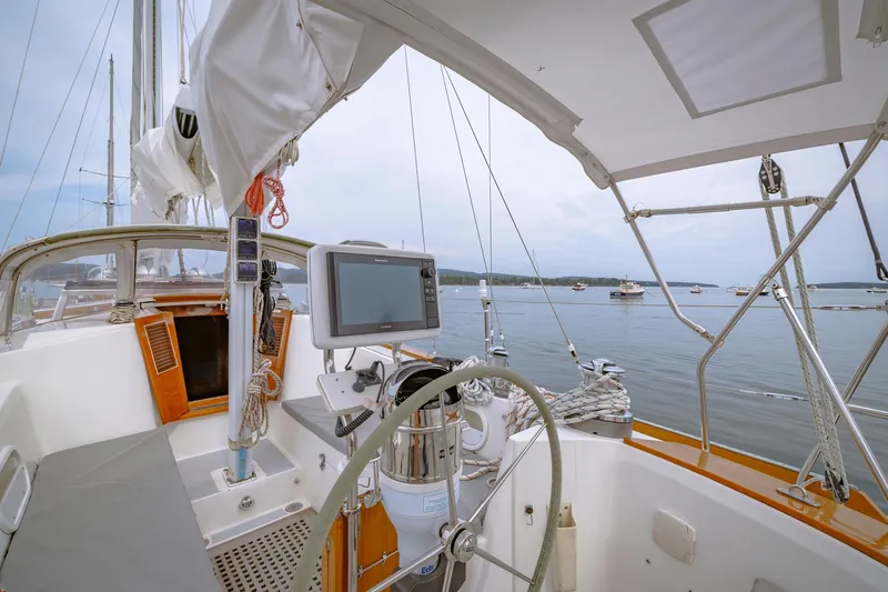 Slide: The Image of Cockpit view of a 2001 Shannon 47/52 sailboat with navigation equipment. - 28