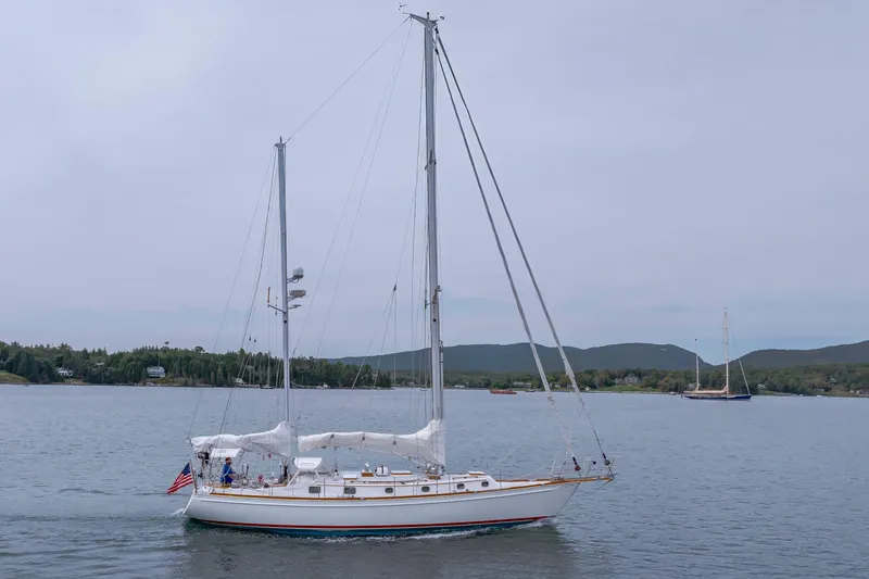 Slide: The Image of Sailing yacht Shannon 47/52 (2001) cruising on calm waters with scenic background. - 5