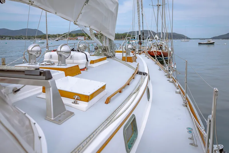 Slide: The Image of Sailboat deck view on water, Shannon 47/52 model, 2001, with scenic background. - 20
