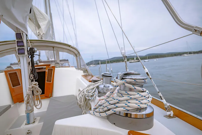 Slide: The Image of Sailboat deck view with ropes, Shannon 47/52 model, 2001, on calm waters. - 31