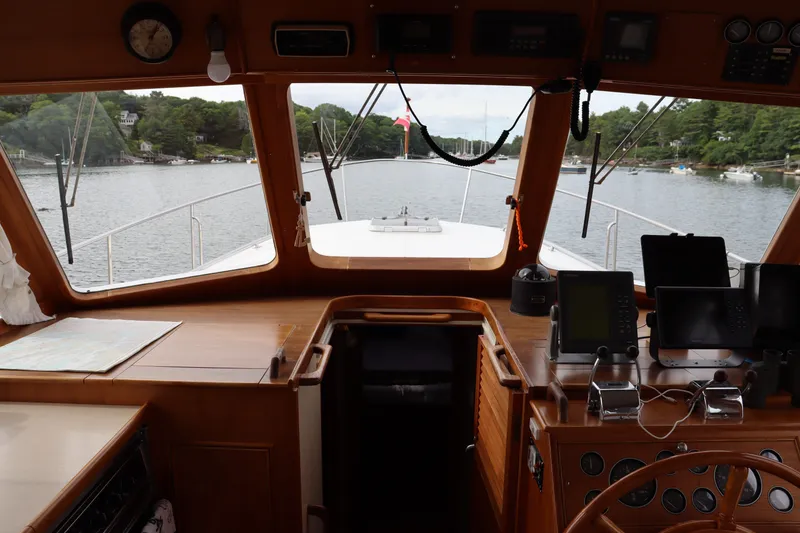 Slide: The Image of Interior view of 1996 Eastbay 40 Express Grand Banks yacht cockpit with navigation equipment. - 19