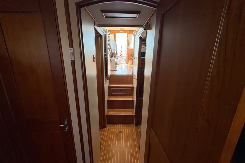 Slide: The Image of Interior hallway of 1996 Grand Banks 40 Eastbay EX yacht with wooden finish. - 36