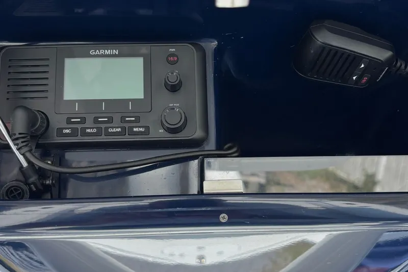 Slide: The Image of Garmin marine radio on 2021 Yellowfin 26 Hybrid boat dashboard. - 14