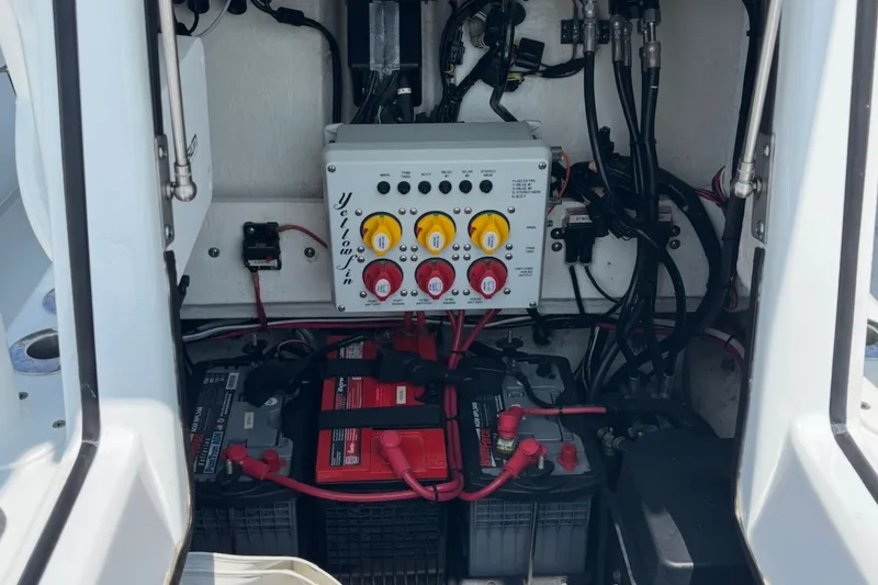 Slide: The Image of Electrical system of a 2021 Yellowfin 26 Hybrid boat, featuring batteries and wiring. - 20