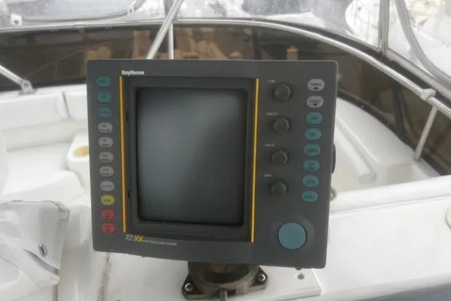 Slide: The Image of Raytheon marine navigation system on 1996 Silverton 41 Convertible yacht. - 9