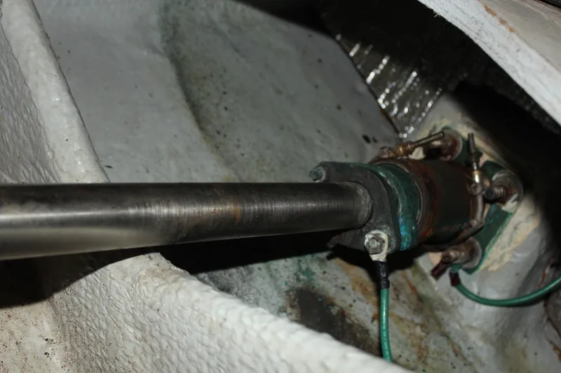 Slide: The Image of Close-up of a 1996 Silverton 41 Convertible boat's propeller shaft and coupling. - 36