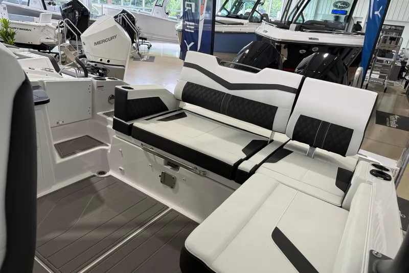 Slide: The Image of 2027 Monterey Elite 27 OB boat interior with stylish seating and modern design. - 11