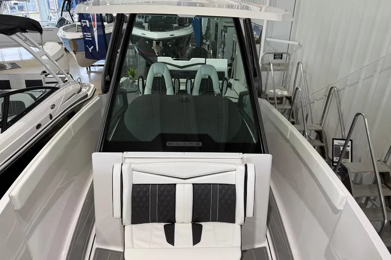 Slide: The Image of 2027 Monterey Elite 27 OB boat interior with sleek seating and modern design. - 5
