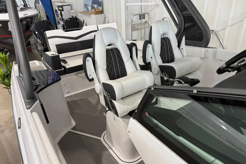 Slide: The Image of 2027 Monterey Elite 27 OB boat interior with luxurious seating and modern design. - 6