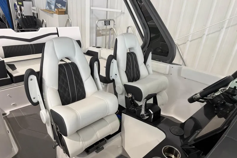 Slide: The Image of Luxury seating in 2027 Monterey Elite 27 OB boat cockpit, featuring modern design and comfort. - 9