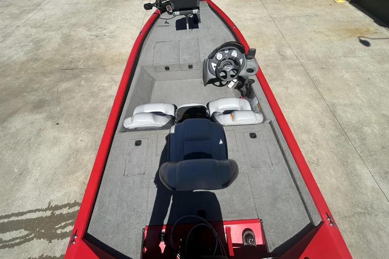 Slide: The Image of 2008 Tracker Pro Team 175 TXW boat interior with steering console and seating. - 8