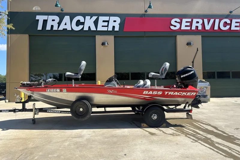 The Image of 2008 Tracker Pro Team 175 TXW bass boat parked at service center. - 1
