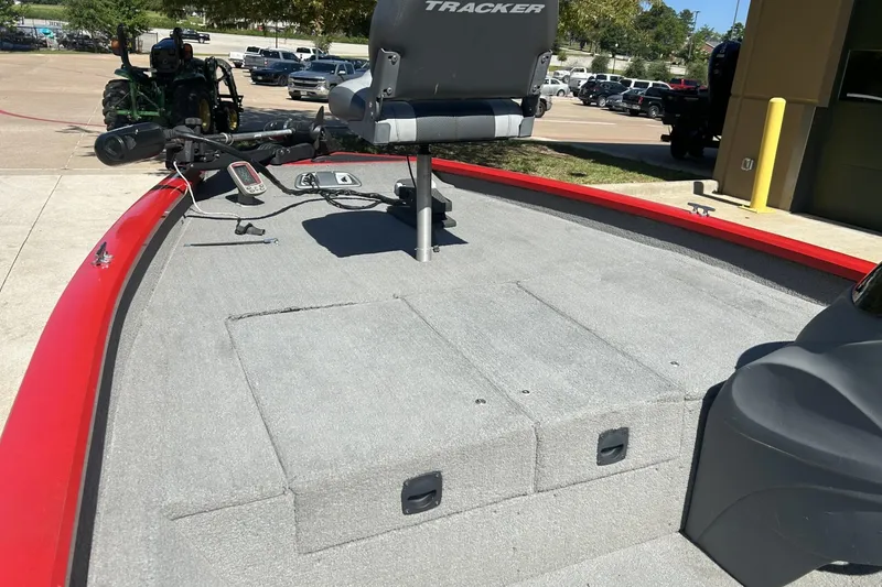 Slide: The Image of 2008 Tracker Pro Team 175 TXW boat deck with seating and fishing equipment. - 6