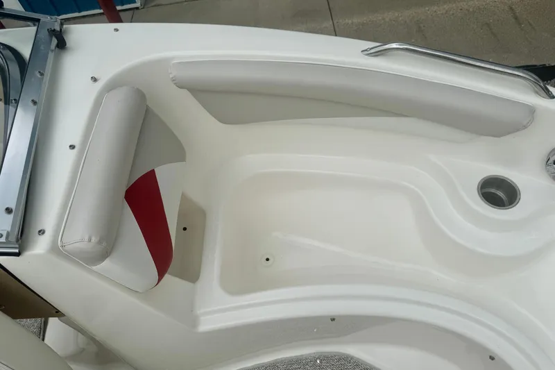 Slide: The Image of 2008 Glastron GT 225 boat interior with white and red seating. - 45