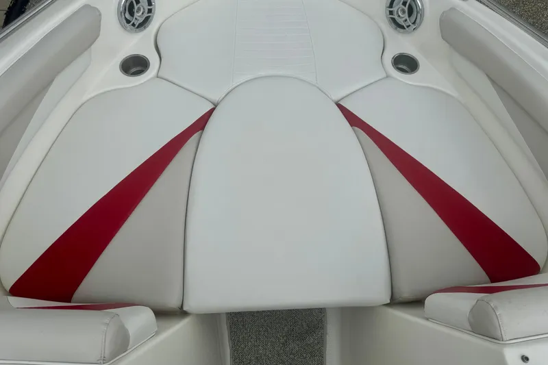 Slide: The Image of 2008 Glastron GT 225 boat interior with white and red seating. - 41