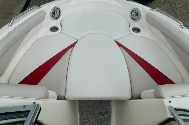 Slide: The Image of 2008 Glastron GT 225 boat interior with white and red seating. - 38