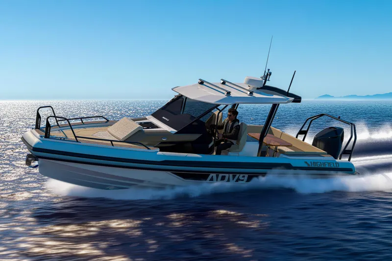 Slide: The Image of Highfield ADV9 2027 boat cruising on open water under clear blue sky. - 2