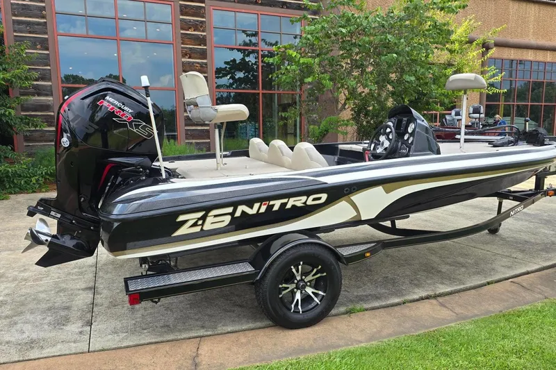 Slide: The Image of 2013 Nitro Z-6 boat with Mercury Pro XS engine on a trailer. - 5