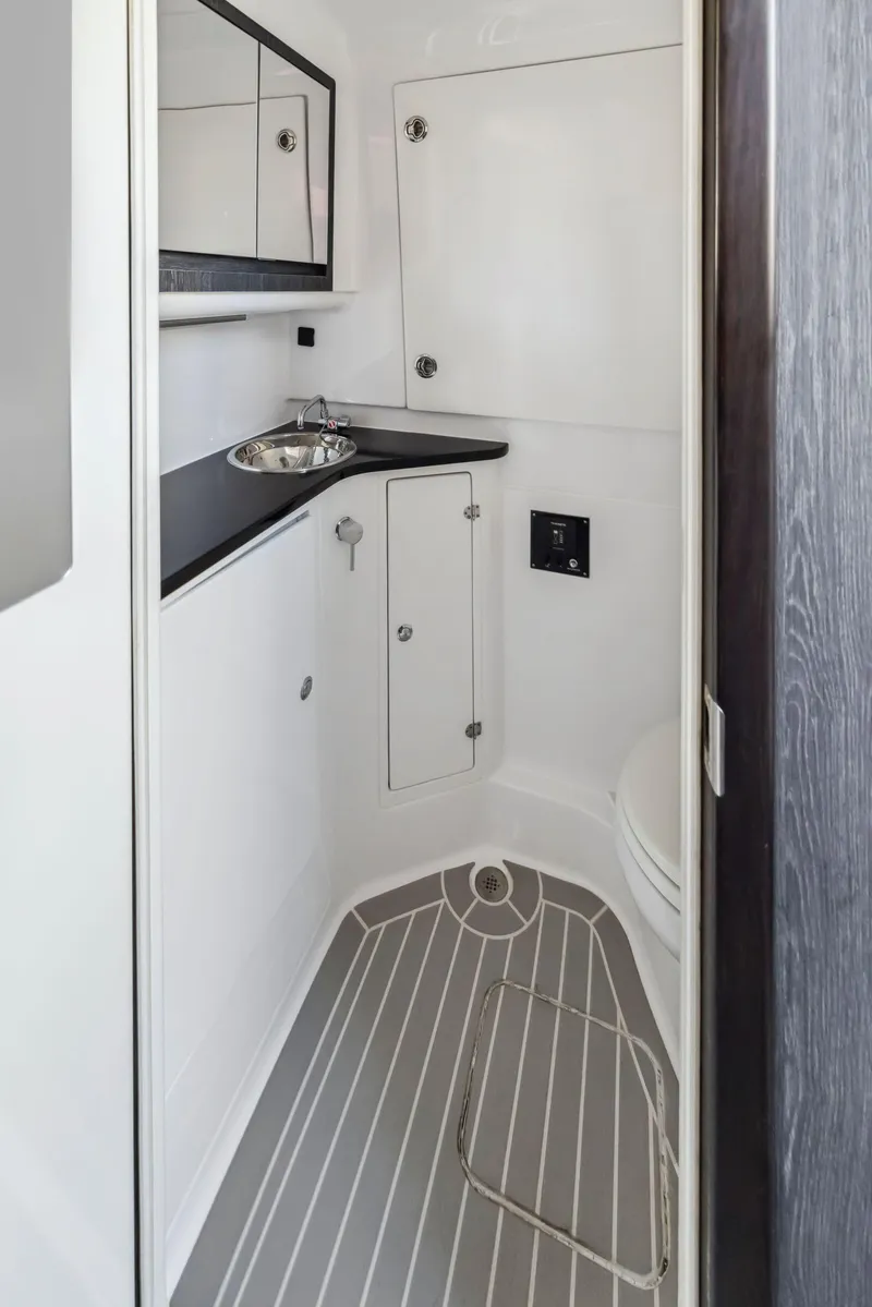 Slide: The Image of 2022 Cigarette 42 Auroris boat bathroom with sleek design and modern fixtures. - 31