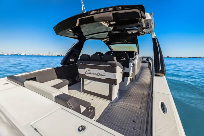 Slide: The Image of 2022 Cigarette 42 Auroris luxury boat on calm blue water. - 15