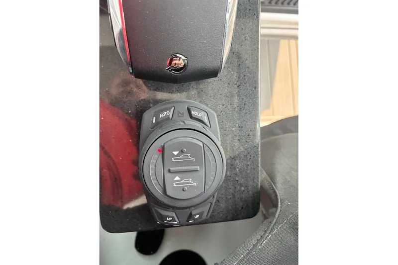 Slide: The Image of Control panel of 2026 Monterey Elite 25 OB boat with adjustment buttons. - 4