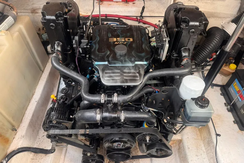 Slide: The Image of Engine of a 2009 Sea Ray 270 Sundancer boat, showcasing the 350 MPI motor. - 27